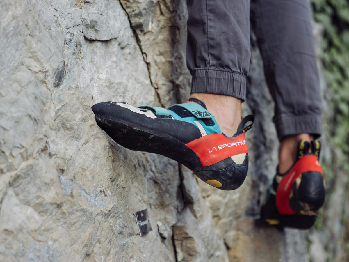 Climber standing on resoled shoes